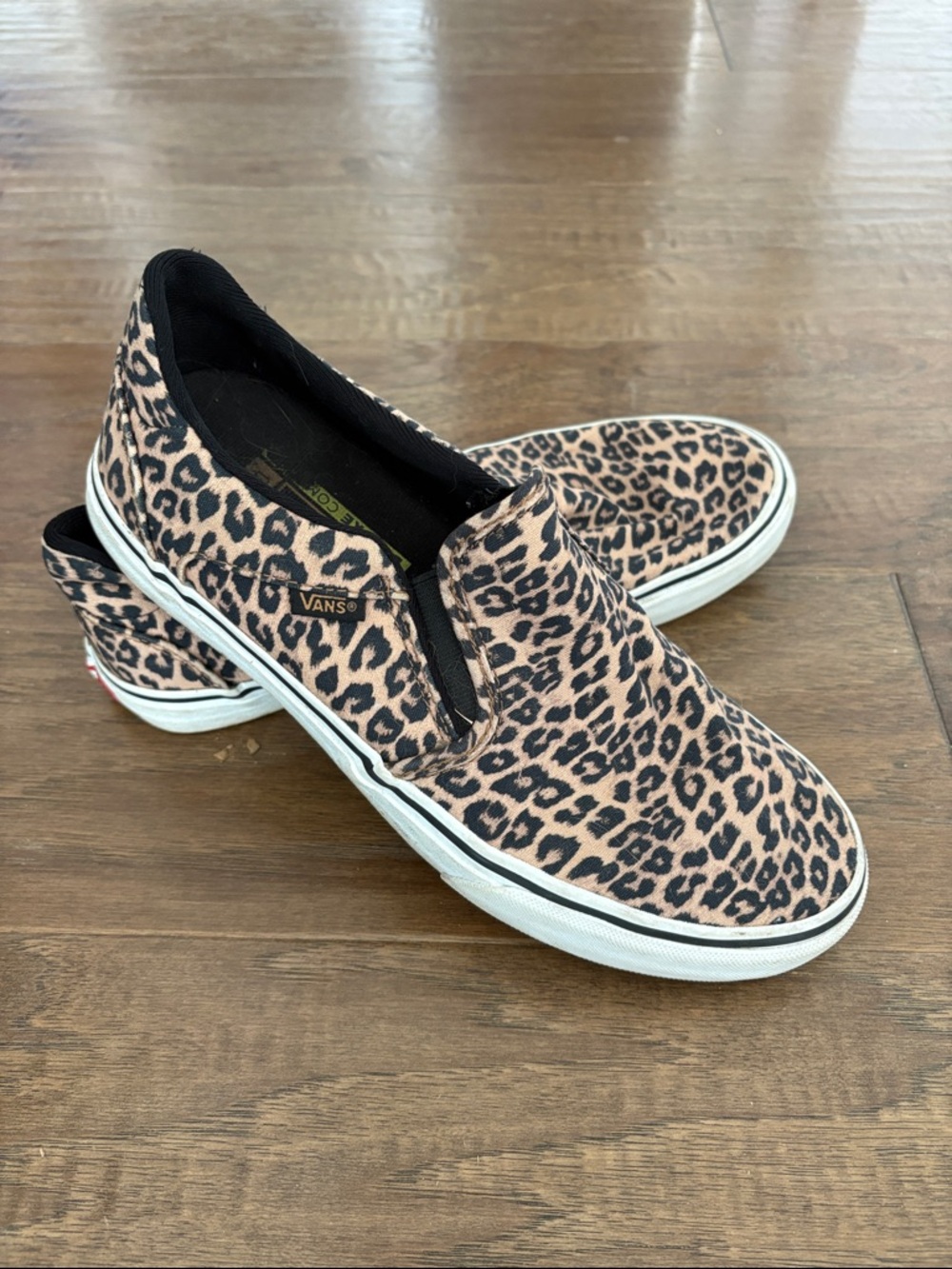 Vans Women's Slip-On Sneakers in Leopard Print Tan and Black